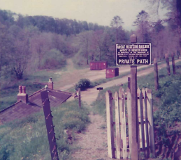 The notice was found half buried part way up the path. It was painted and put back on its post, from where it was stolen again. Teign Valley Branch