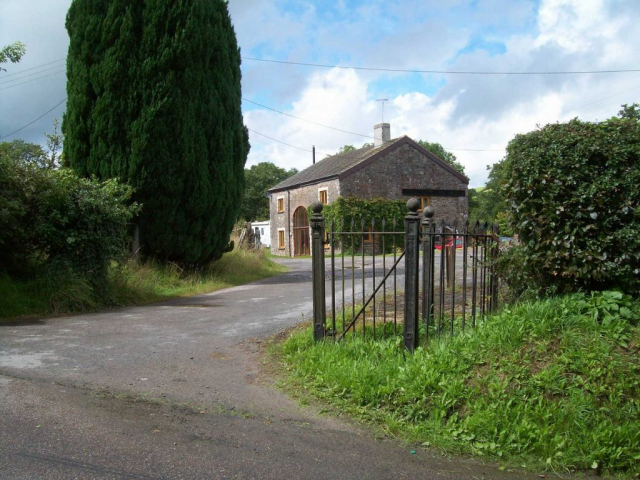 The former Goods Shed is now a dwelling. Behind the camera, the old “Auction Mart” is now part of the pub’s extensive campsite. Devon & Somerset Railway