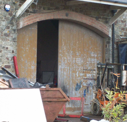 The colour of the Goods Shed door, more ochre than umber, matches the Pumphouse door at Christow. Devon & Somerset Railway