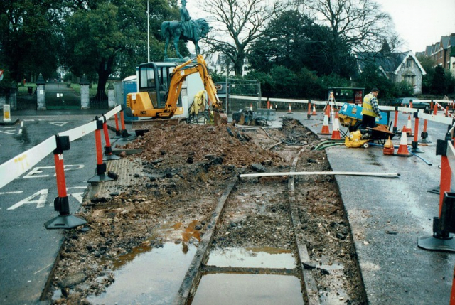 The tramway exposed during roadworks at the junction of Hele Road and New North Road. This is looking towards the city centre. Bury Meadow is seen at left. Exeter Corporation Tramways
