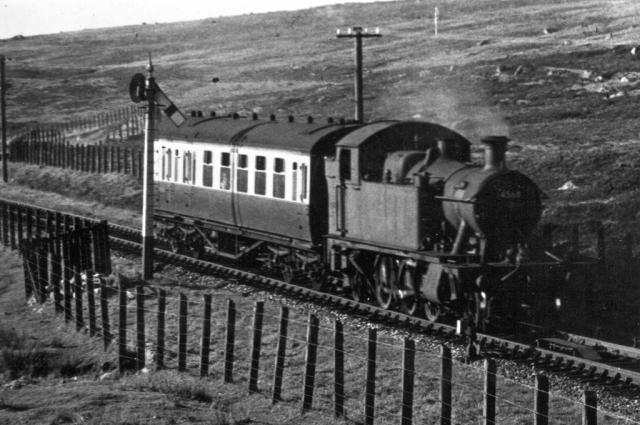 A view from the accommodation bridge of a train approaching the terminus. Princetown Branch