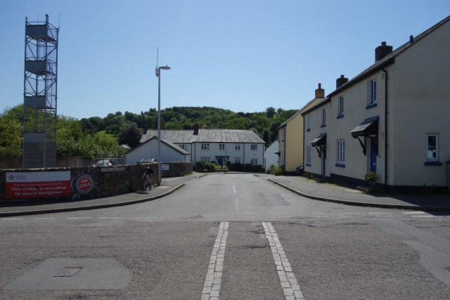 Turnlake Road joins the main road opposite the school. The Fire Station at left was built by Fry's. Bellacouch Meadow