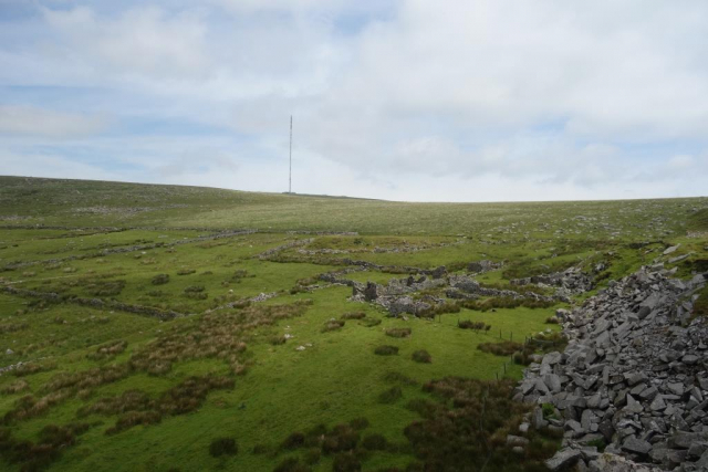 Looking across the ruins of Eva's Farm. The tramway continues towards Yellowmeade at centre. Foggintor