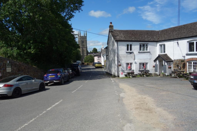 The landlord of The Red Lion came out and was friendly. The underground community shop is off camera at left. Eggesford to Okehampton